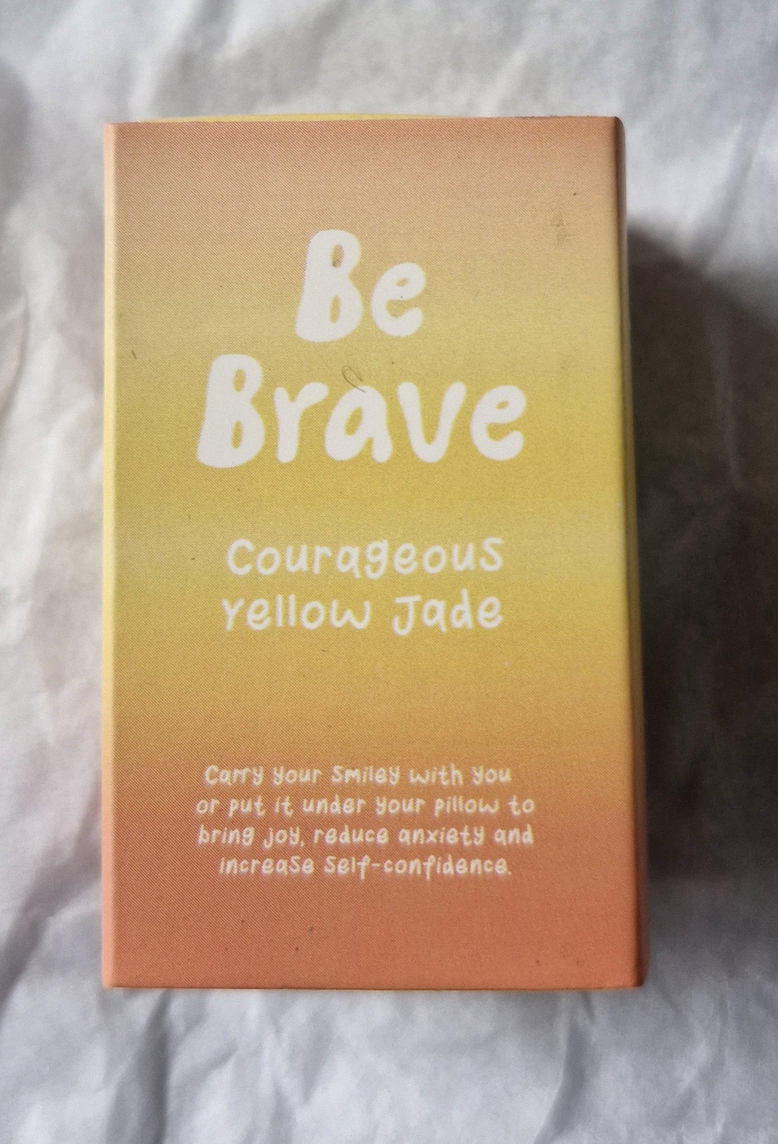 Courageous yellow jade smiley face