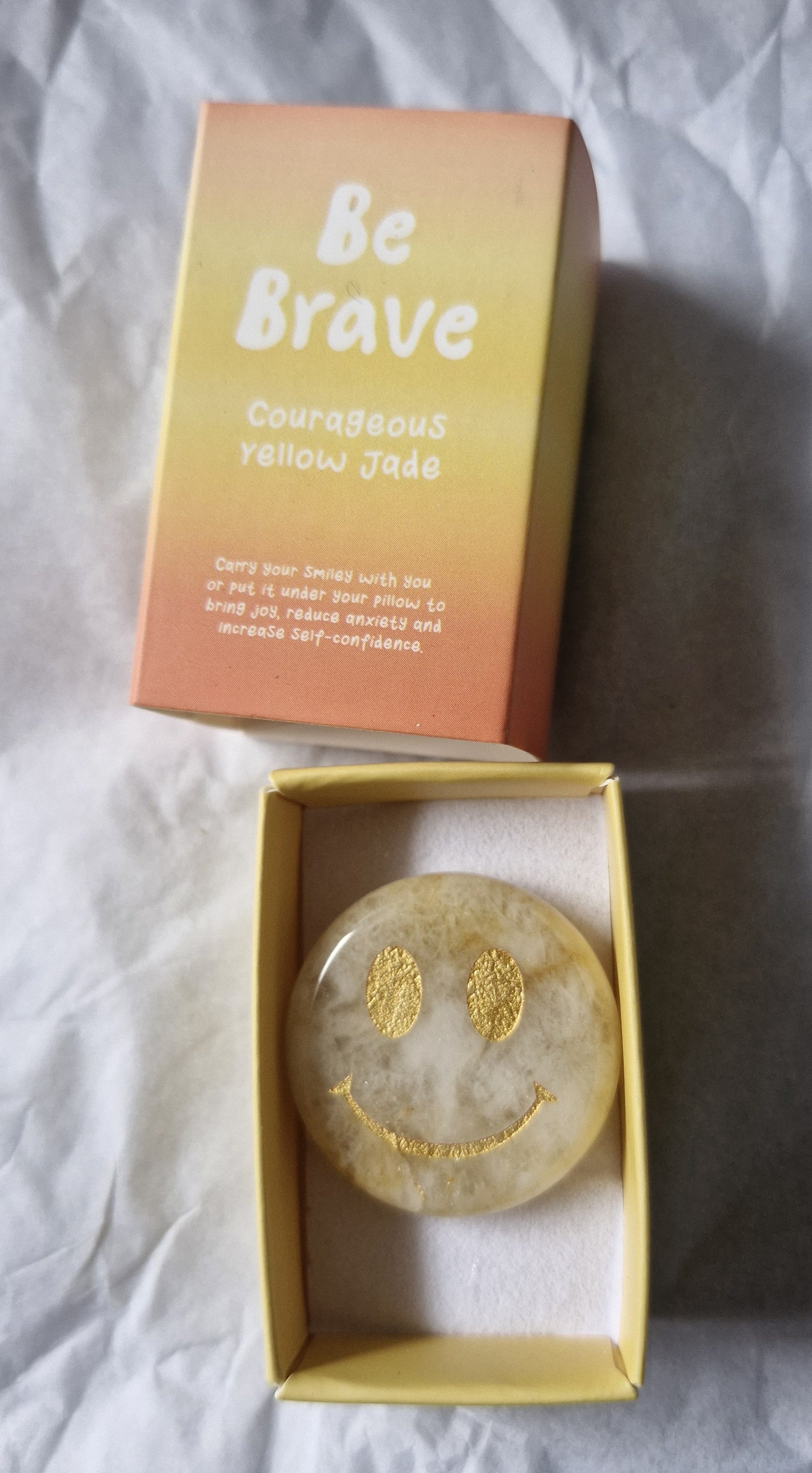 Courageous yellow jade smiley face