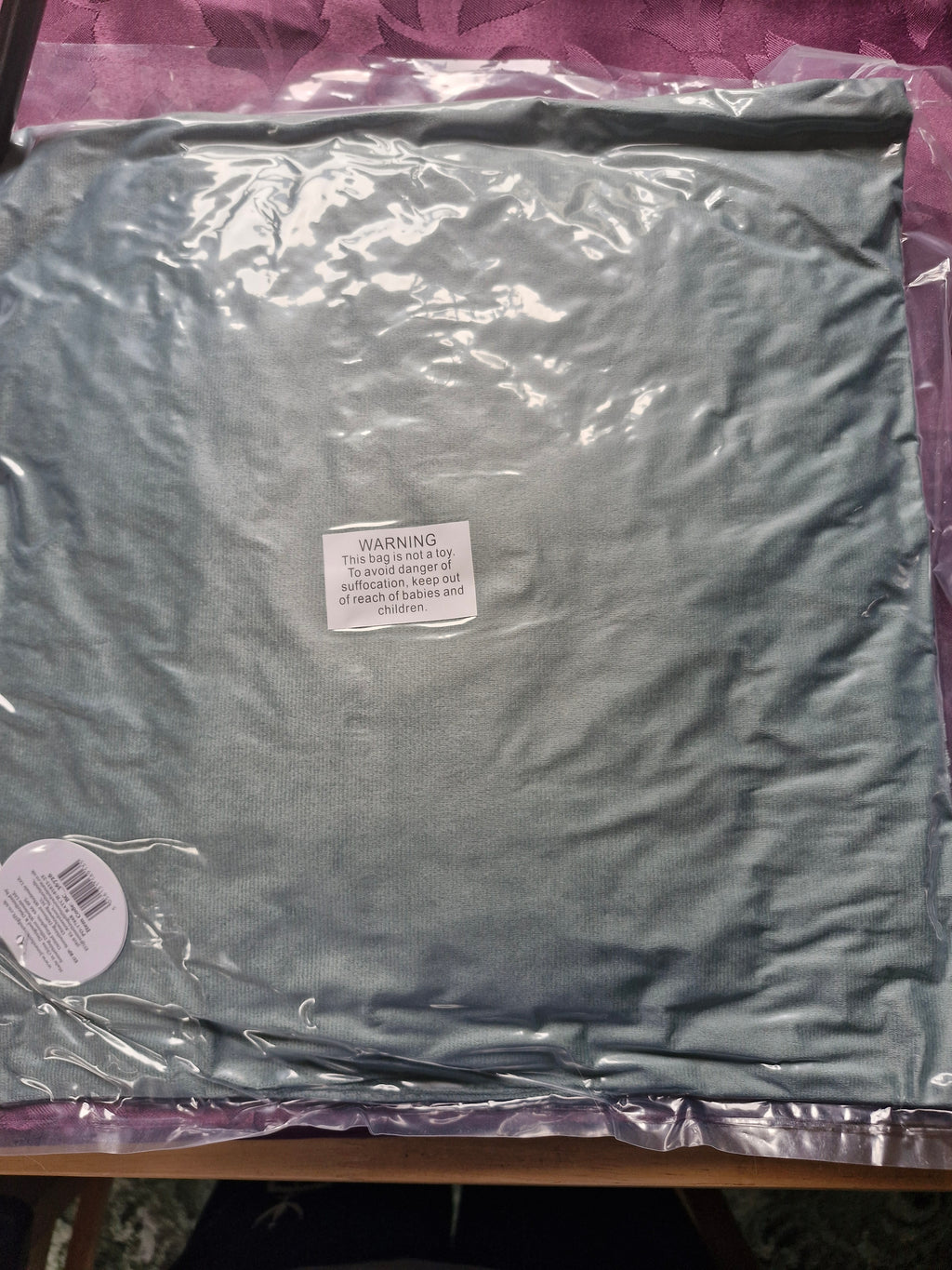 Cushion with book pocket