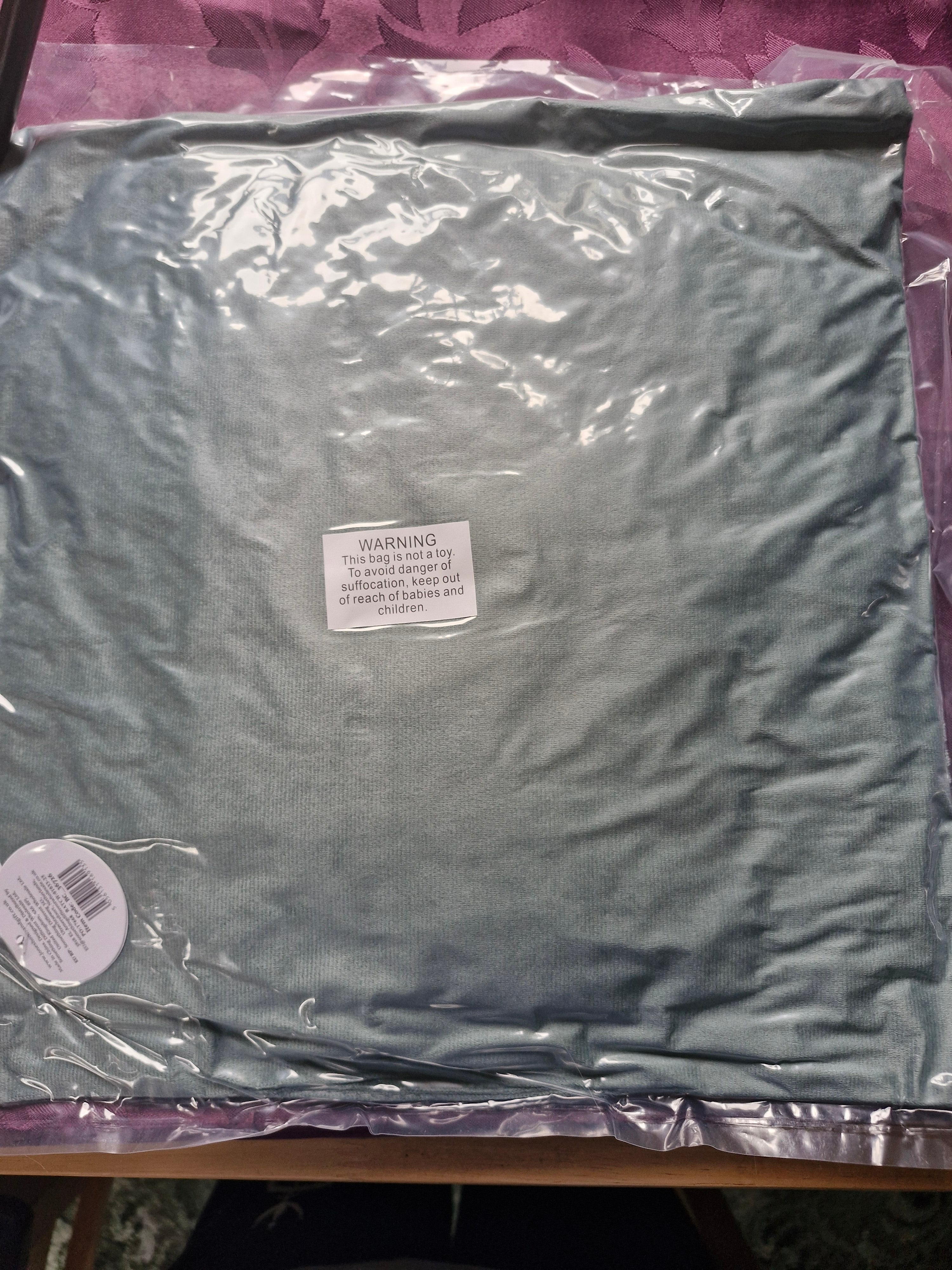 Cushion with book pocket